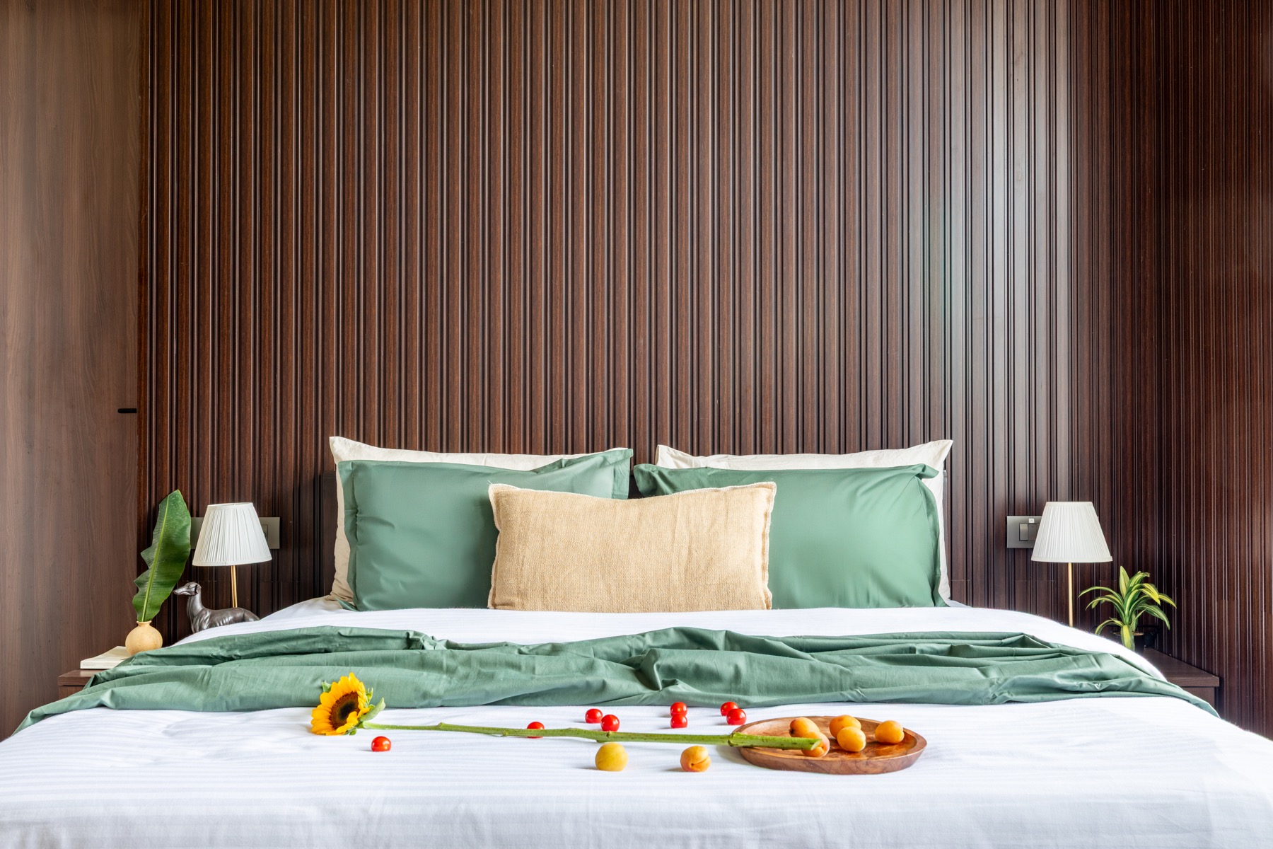 Spacious green-accented bedroom at 7 Farms Karjat